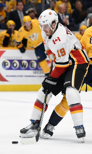 Tkachuk's trickery sends Flames past Predators 6-5 in OT